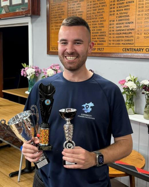 Dan winning three pool trophies in Narberth